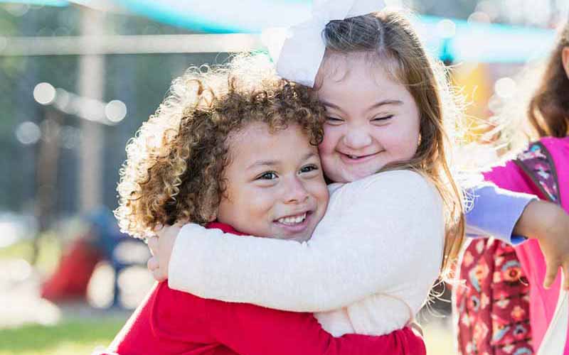 two children hugging