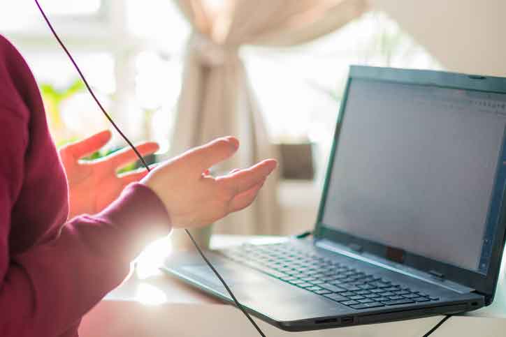 teacher engaged in virtual conference